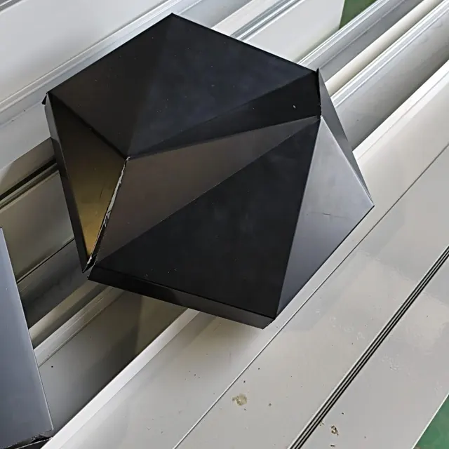 Folded black hexagonal faceted ACP cassette